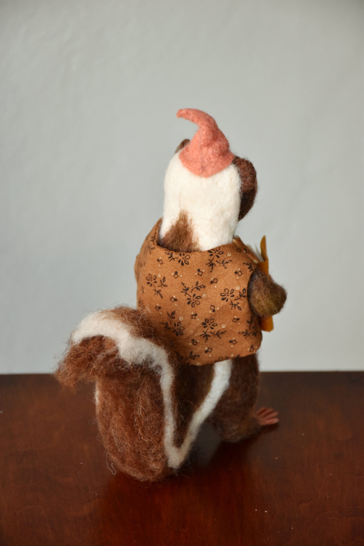 Needle Felted Wanderer Reader Brown Skunk