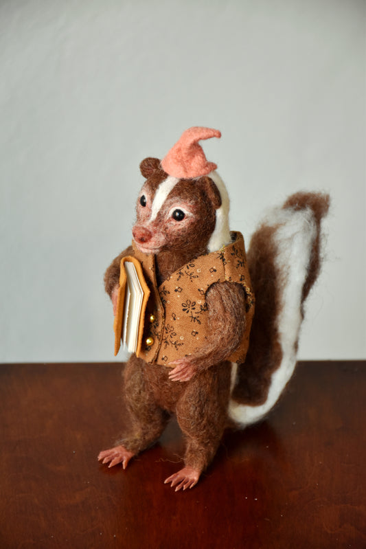 Needle Felted Wanderer Reader Brown Skunk