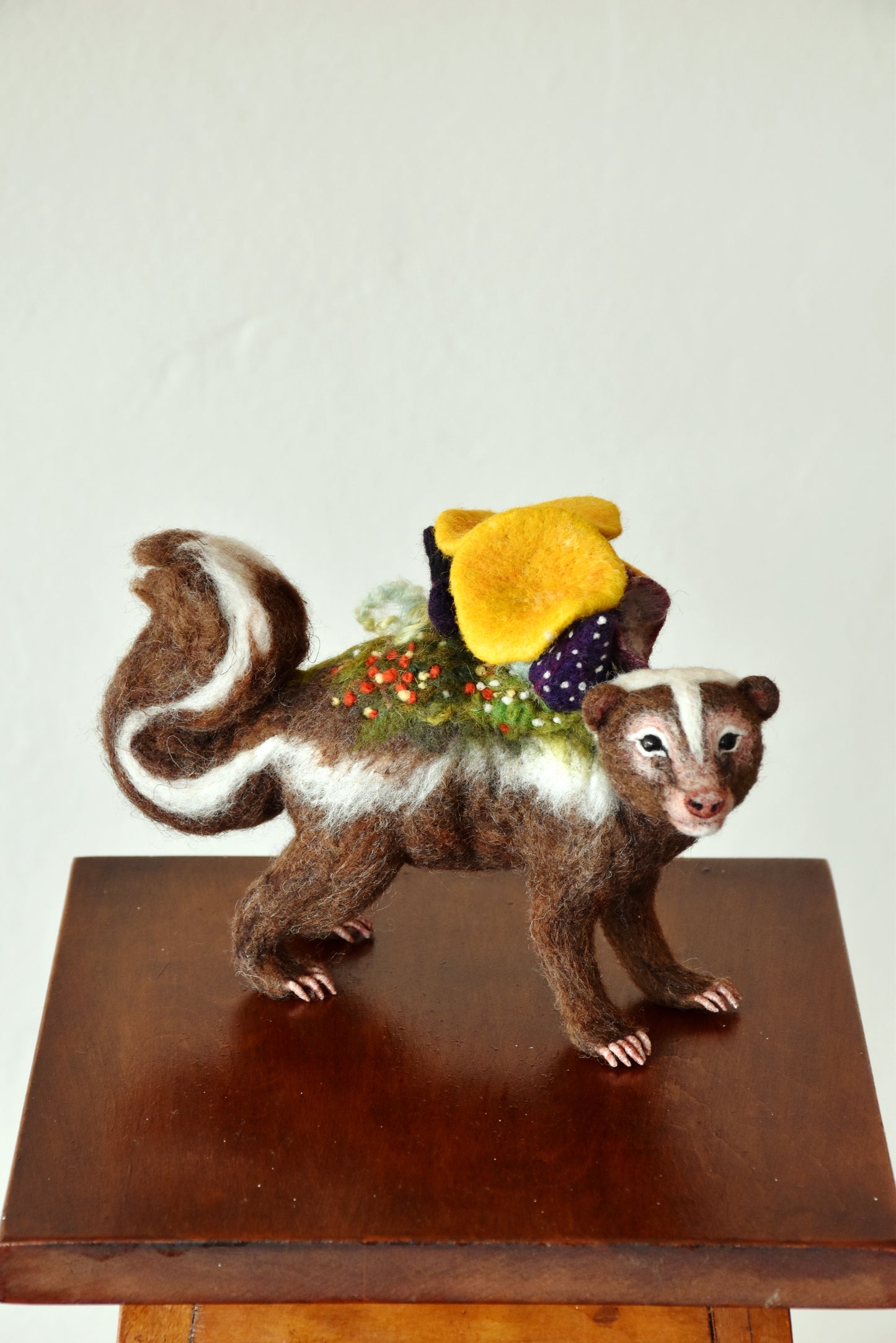 Needle Felted Brown Skunk Bound by Nature