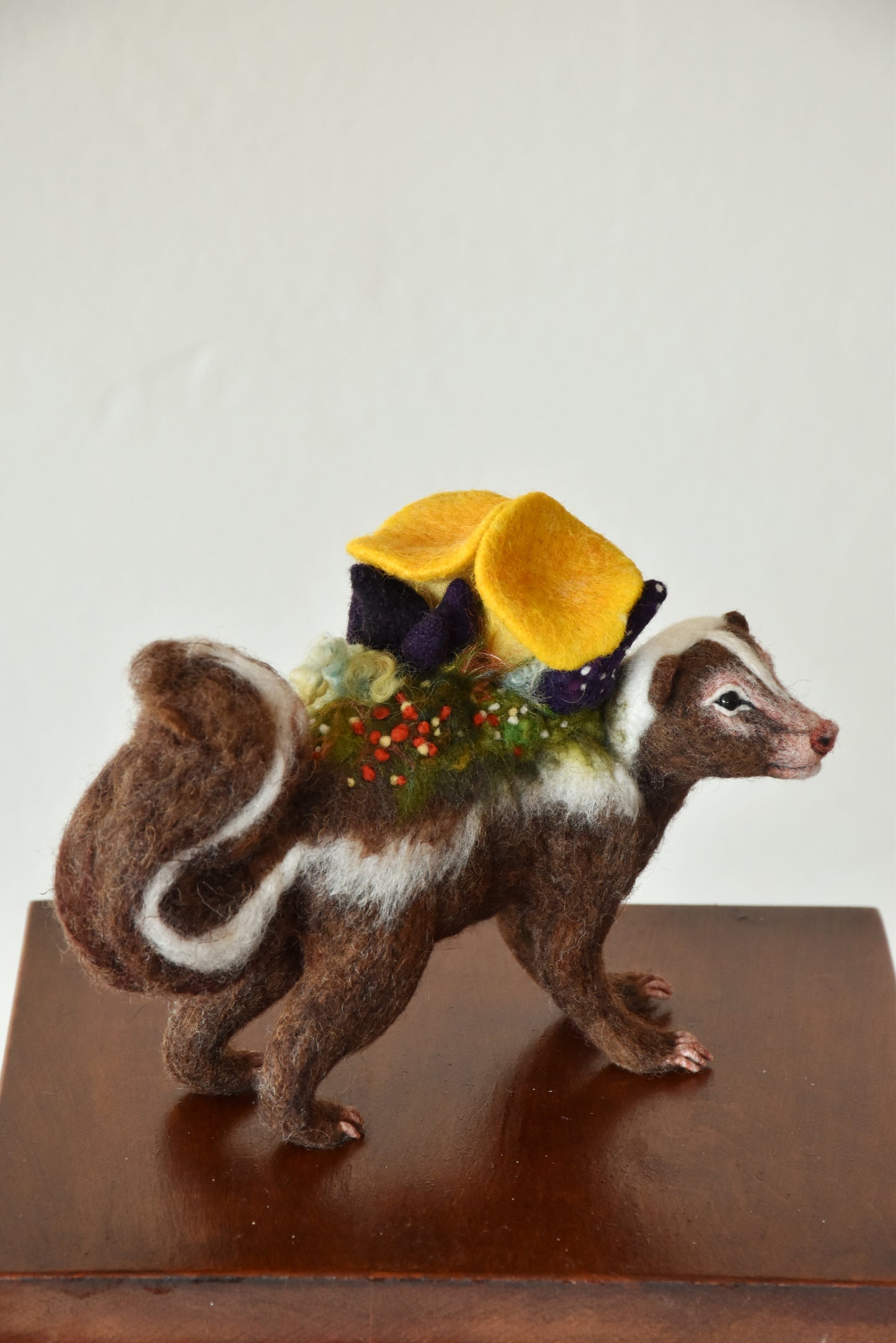 Needle Felted Brown Skunk Bound by Nature