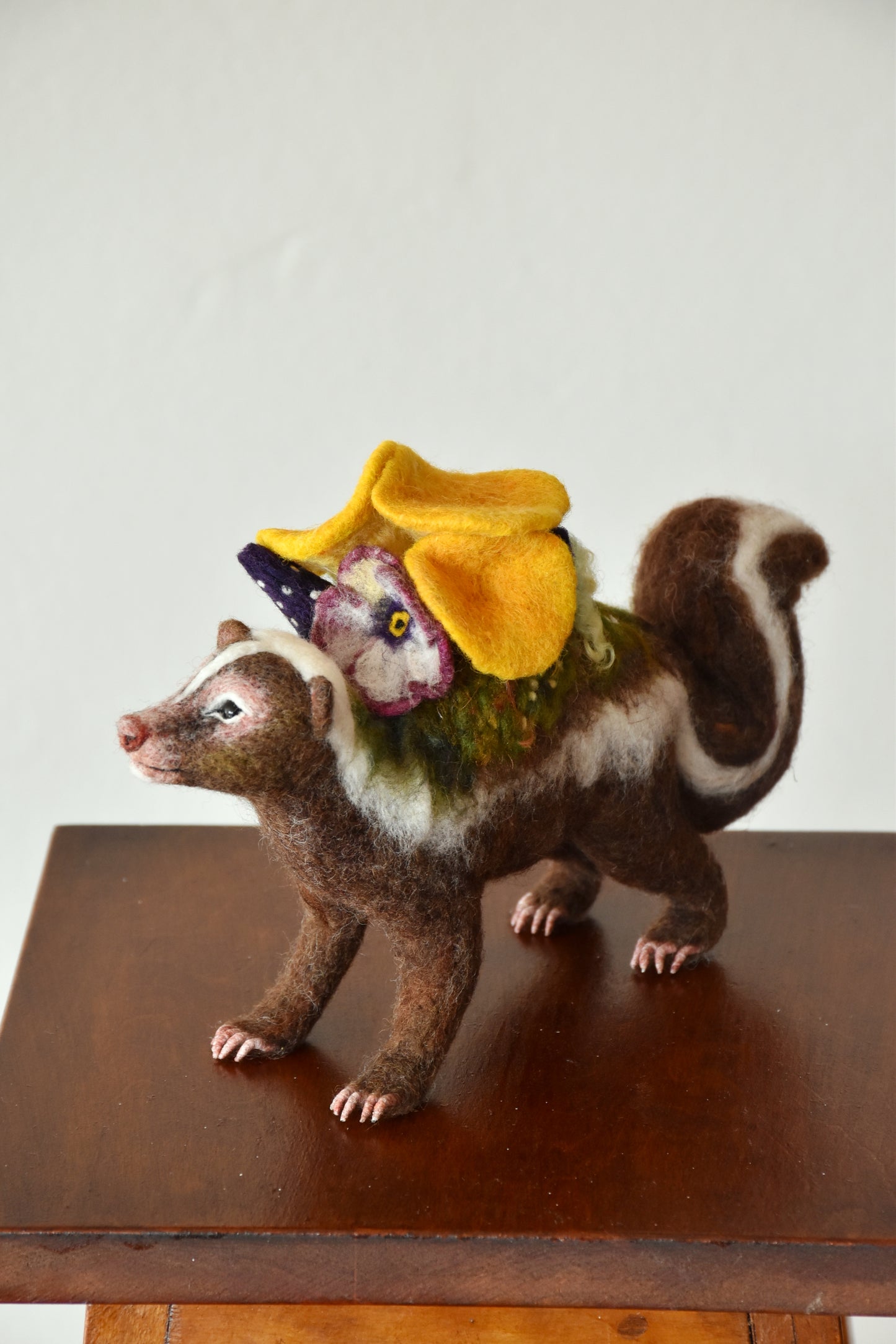 Needle Felted Brown Skunk Bound by Nature